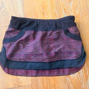Lululemon Skirt. Purple with black trim. Size 8